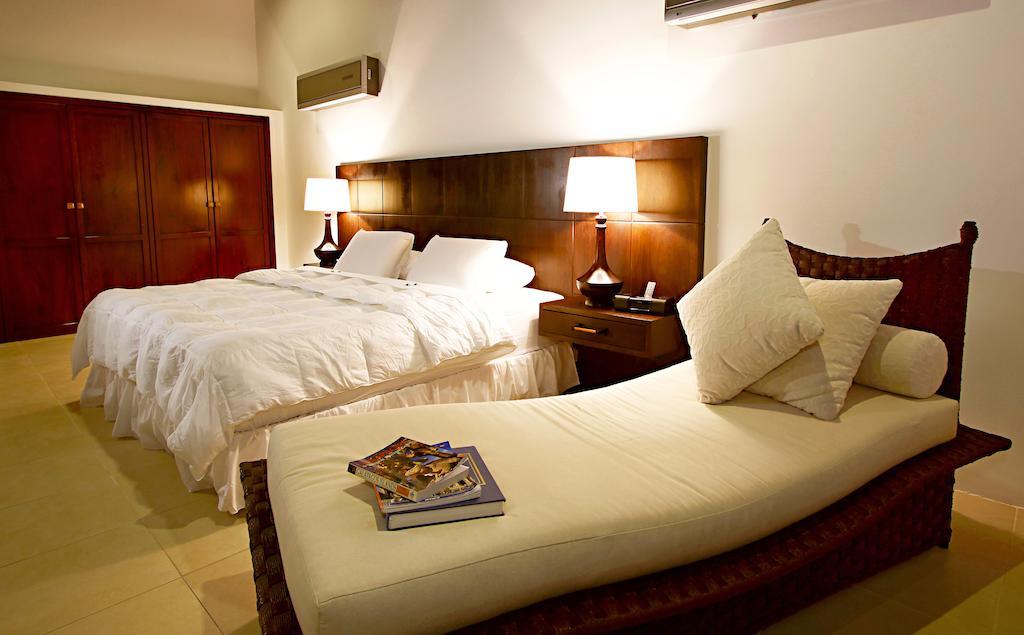 Iguana Crossing Boutique Hotel Puerto Villamil Phòng bức ảnh